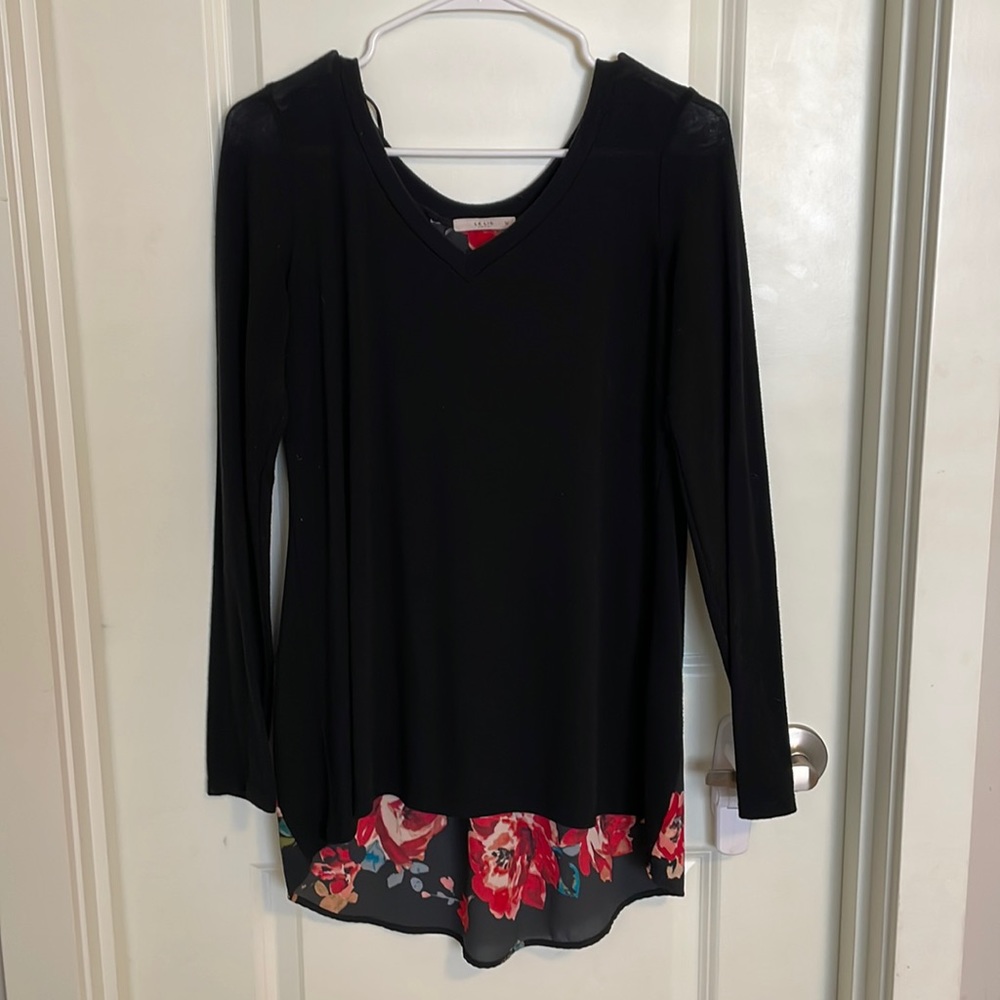 Black maternity dress with floral details.